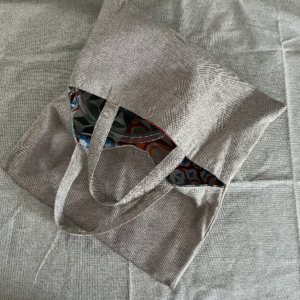 Bolsa para transportar fuentes beige y lona diseños azulejos de colores por dentro